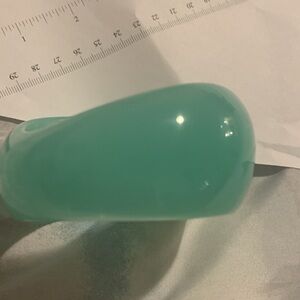 Aqua or teal lucite type bangle bracelet more in my closet